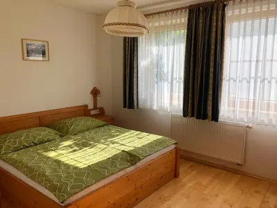 Ein Bett oder Betten in einem Zimmer der Unterkunft Ferienwohnung Hubenbauer