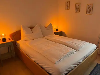 Ein Bett oder Betten in einem Zimmer der Unterkunft Ferienwohnung Top 1