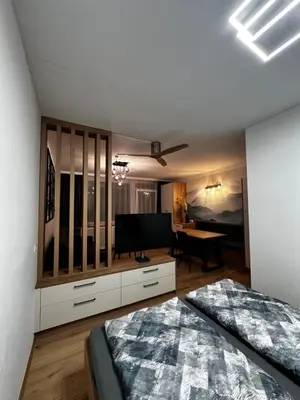 Ein Bett oder Betten in einem Zimmer der Unterkunft Alpenblick - Ferienwohnung Vockner