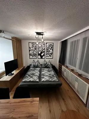 Ein Bett oder Betten in einem Zimmer der Unterkunft Alpenblick - Ferienwohnung Vockner