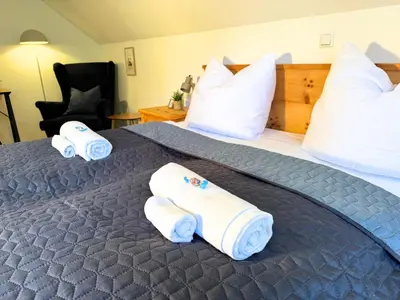 Ein Bett oder Betten in einem Zimmer der Unterkunft Apartment BergWiese 225