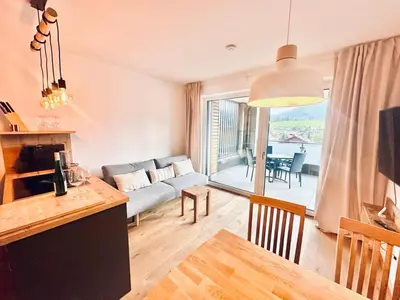 Ein Sitzbereich in der Unterkunft Die Malerei Penthouse by Da Alois