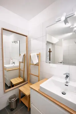 Ein Badezimmer in der Unterkunft Die Malerei Penthouse by Da Alois