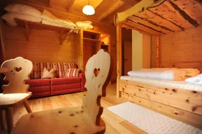 Ein Bett oder Betten in einem Zimmer der Unterkunft Almstallhütte