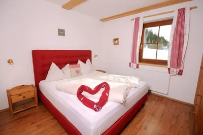 Ein Bett oder Betten in einem Zimmer der Unterkunft Almchalet am Katschberg
