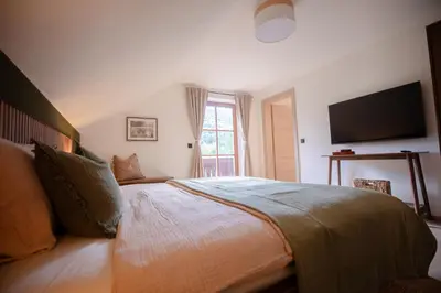Ein Bett oder Betten in einem Zimmer der Unterkunft Das Hinterwald - Auszeit im Grünen