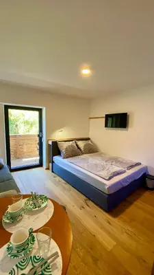 Ein Bett oder Betten in einem Zimmer der Unterkunft Modernes Apartment am Traunsee - See, Berge, Fitness & Parkplatz