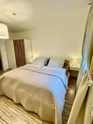 Ein Bett oder Betten in einem Zimmer der Unterkunft PHENIX Alpin Apartment Kreischberg