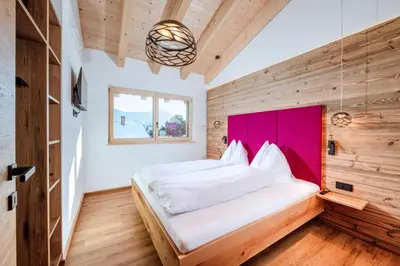Ein Bett oder Betten in einem Zimmer der Unterkunft dein Dahoam Boutique Appartements