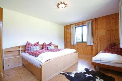 Ein Bett oder Betten in einem Zimmer der Unterkunft Sound of Music Panorama Apartment