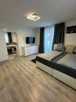 Ein Bett oder Betten in einem Zimmer der Unterkunft Ferienwohnung in den Alpen