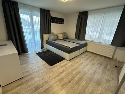 Ein Bett oder Betten in einem Zimmer der Unterkunft Ferienwohnung in den Alpen