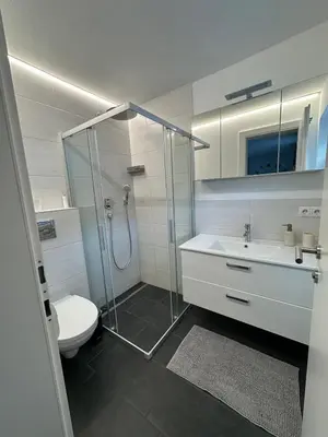 Ein Badezimmer in der Unterkunft Ferienwohnung in den Alpen