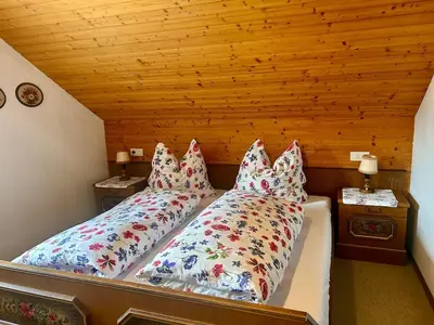 Ein Bett oder Betten in einem Zimmer der Unterkunft Ferienwohnung Bleckwand am Buchberghof