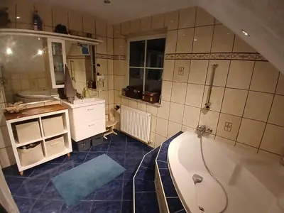 Ein Badezimmer in der Unterkunft Zimmer im Salzkammergut