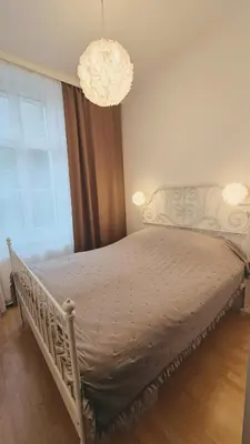 Ein Bett oder Betten in einem Zimmer der Unterkunft Villa Ohrenstein - Komfort Suite