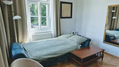 Ein Bett oder Betten in einem Zimmer der Unterkunft Villa Ohrenstein - Komfort Suite