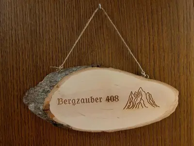 Ein Zertifikat, Auszeichnung, Logo oder anderes Dokument, das in der Unterkunft Bergzauber ausgestellt ist