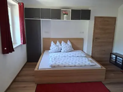 Ein Bett oder Betten in einem Zimmer der Unterkunft Haus Schöffau
