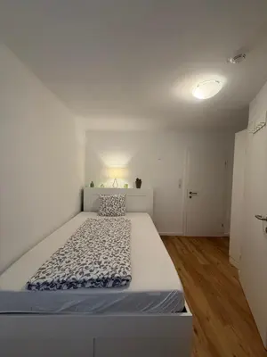 Ein Bett oder Betten in einem Zimmer der Unterkunft Guesthouse Fuschlsee