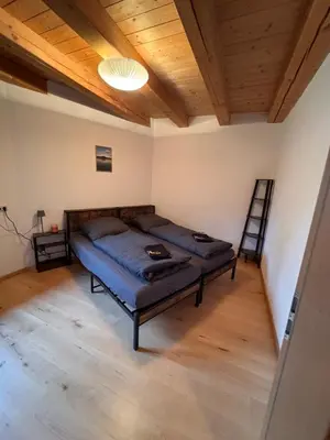 Ein Bett oder Betten in einem Zimmer der Unterkunft Geschlossen - FeWO