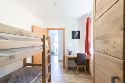 Ein Bett oder Betten in einem Zimmer der Unterkunft Chalet Aineck Snowwhite