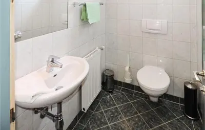 Ein Badezimmer in der Unterkunft Schoene Ferienwohnung Schladm