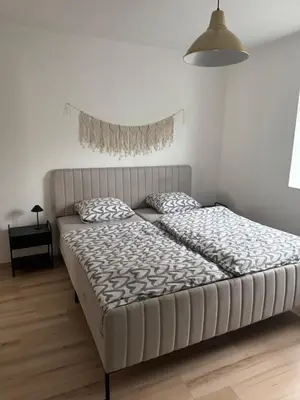 Ein Bett oder Betten in einem Zimmer der Unterkunft Apartment Nice in Gmunden