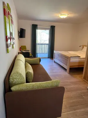 Ein Bett oder Betten in einem Zimmer der Unterkunft Gesäuse-Zimmer