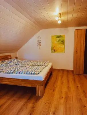Ein Bett oder Betten in einem Zimmer der Unterkunft Bergblick Apartments - Natur & Panorama in Bad Ischl