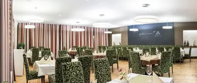 Ein Restaurant oder anderes Speiselokal in der Unterkunft Gasthof Post
