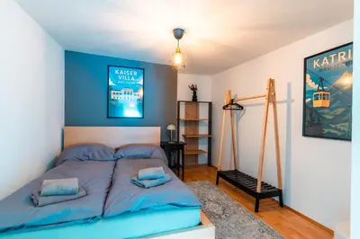 Ein Bett oder Betten in einem Zimmer der Unterkunft Im Herzen von Bad Ischl#3