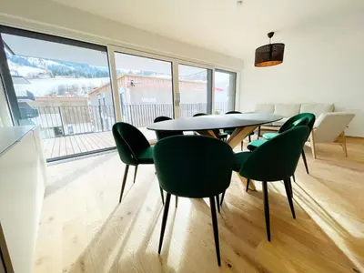 Ein Sitzbereich in der Unterkunft Ennstal-Homes