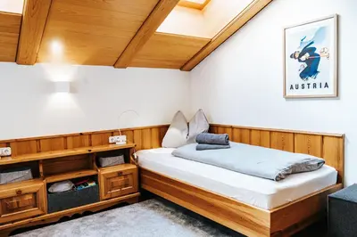 Ein Bett oder Betten in einem Zimmer der Unterkunft ALPINE Appartement 407 Schladming by globboard
