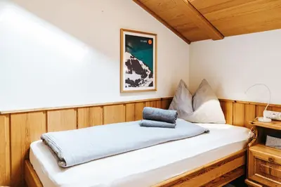 Ein Bett oder Betten in einem Zimmer der Unterkunft ALPINE Appartement 407 Schladming by globboard