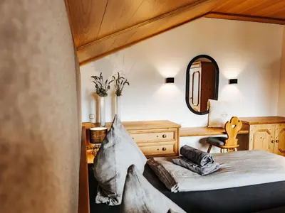 Ein Bett oder Betten in einem Zimmer der Unterkunft ALPINE Appartement 407 Schladming by globboard