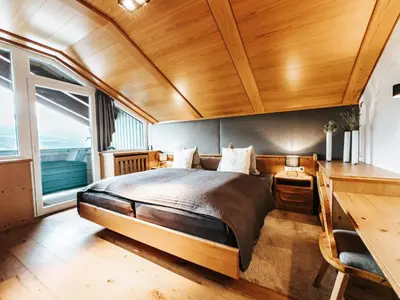 Ein Bett oder Betten in einem Zimmer der Unterkunft ALPINE Appartement 407 Schladming by globboard