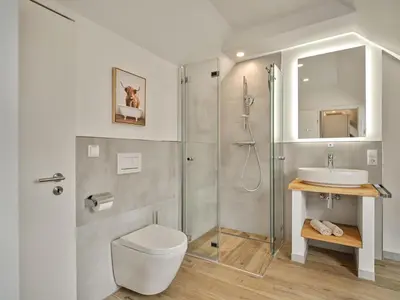 Ein Badezimmer in der Unterkunft Penthouse Cassiopeia by AA Holiday Homes SKI IN SKI OUT