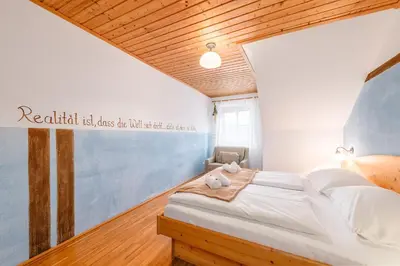 Ein Bett oder Betten in einem Zimmer der Unterkunft BioHAUS - by myNests