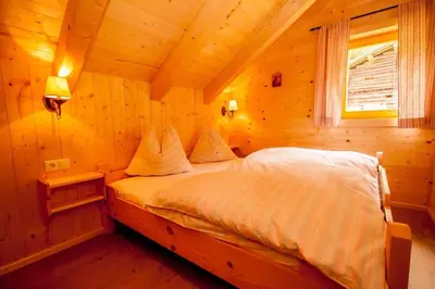 Ein Bett oder Betten in einem Zimmer der Unterkunft Hütte Höhenegg