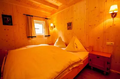 Ein Bett oder Betten in einem Zimmer der Unterkunft Hütte Höhenegg