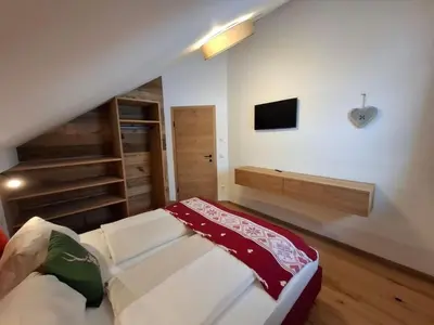 Ein Bett oder Betten in einem Zimmer der Unterkunft Chalet Katschberg Panorama