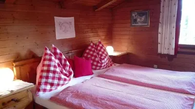 Ein Bett oder Betten in einem Zimmer der Unterkunft Neukam Hütte