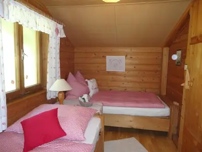Ein Bett oder Betten in einem Zimmer der Unterkunft Neukam Hütte
