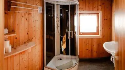 Ein Badezimmer in der Unterkunft Grasreithütte