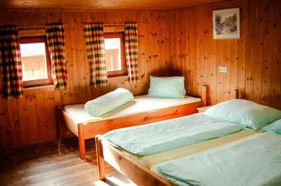 Ein Bett oder Betten in einem Zimmer der Unterkunft Grasreithütte