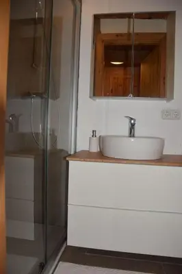 Ein Badezimmer in der Unterkunft Achtchalet
