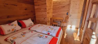 Ein Bett oder Betten in einem Zimmer der Unterkunft Faschinghütte
