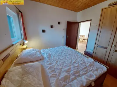 Ein Bett oder Betten in einem Zimmer der Unterkunft Apartment Grimmingsuite