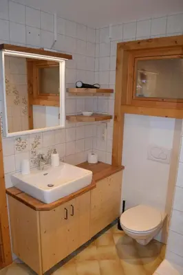 Ein Badezimmer in der Unterkunft FamilienAppartement Waldstüberl